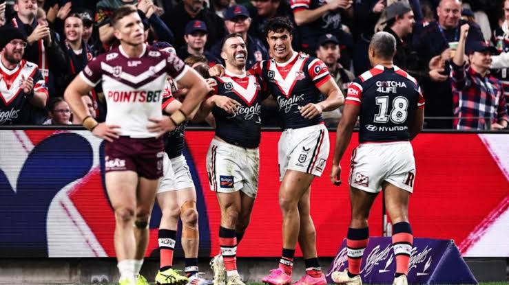 Breaking news: Sydney Roosters survive huge scare in narrow win….