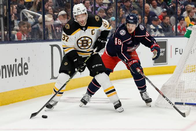 “BATTLE FOR THE POSTSEASON: Bruins Face Off Against…